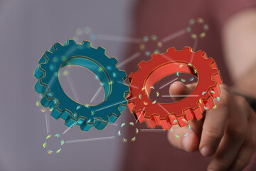 Poster - Abstract image of two gears working together, symbolizing teamwork, cooperation, and synergy.