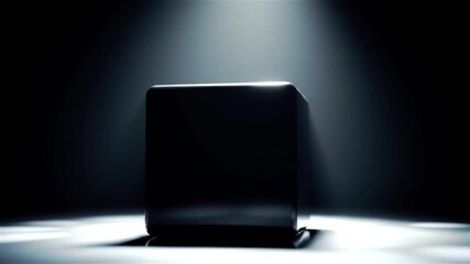 Poster - Black Shiny Cube Under Spotlight on Reflective Surface Against Dark Gradient Background