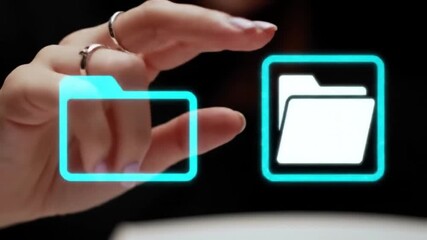Poster - Hand Touching Two Folder Icons With White and Light Blue Design Elements on Digital Interface Storage and File