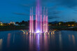 © humanaut - Fountain view at midnight park with colorful lights