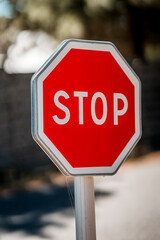 Wall Mural - stop sign on a road
