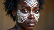© Radorog. - Portrait of an African woman with a painted face with national patterns , ritual,