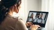 © Lira - A business woman engages in a video conference on her laptop highlighting remote communication