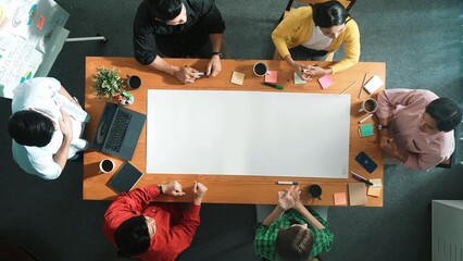 Poster - Time lapse of diverse business team designing and planning project while skilled project manager walking and joining meeting at meeting table with sticky notes and laptop at boardroom. Convocation.