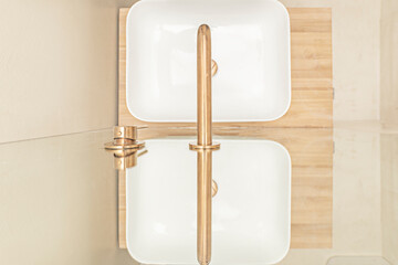 Aufkleber - the sink and faucet. Far from being mere utilitarian components, they have become centerpieces of design
