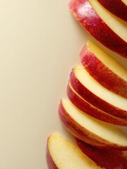Poster - Sliced Apples Arranged Vertically With a Smooth Background Providing a Clean Aesthetic Suitable for Presentations or Culinary Displays