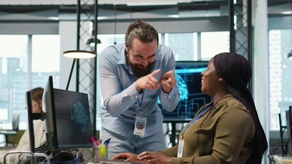 Poster - Joyous colleagues having fun during job shift break, doing bonding, concept of positive office culture. Workplace friends having playful discussion while using AI to optimize code, camera A