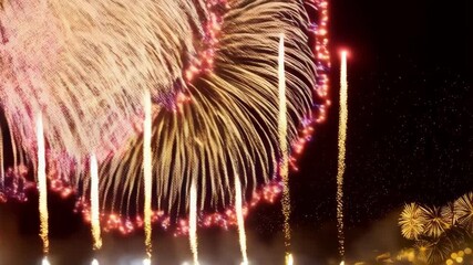 Poster - Golden festive fireworks exploding in the night sky, celebrating a special event with bright sparkling lights and bokeh.