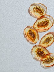 Poster - Transparent Papaya Slices in Golden Gel Create a Minimal Composition With Untouched White Space Highlighted for Visual Effect