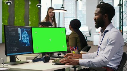 Poster - Software developer using AI on green screen computer to optimize performance and forecast issues. Man in office training machine learning models using mockup PC, camera A