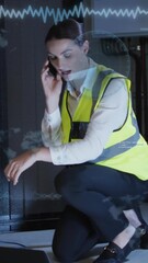 Poster - Animation of data processing over caucasian female engineer talking on smartphone at server room