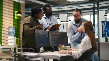 Fototapete - Startup newcomer making friends in office, learning how to use machine learning tech. Upbeat young girl in workplace chatting with coworkers while using AI predictive models, camera A