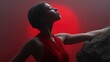 © BOJOShop - Silhouette of a woman in a red dress with eyes closed head tilted back against a red background