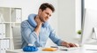 © Tuwaeteemoh - Young Man Experiencing Neck Pain While Working at Desk with Neck Support