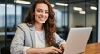 © Png stock 26 - Photo of a young businesswoman works on her laptop in a modern office