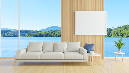 Poster - A modern living room featuring a white sofa, a scenic view of a lake, and minimalist decor with natural light and wooden elements