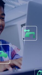 Poster - In school, smiling boy using laptop with animation of environmental icons