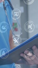 Poster - Animation of business icons over caucasian female doctor writing on clipboard