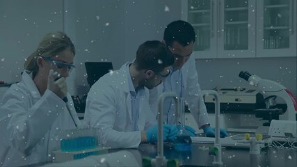 Poster - After supervisor note, researchers pipetting and mixing reagent in lab for analysis with particles