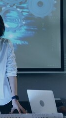 Poster - In conference room, businesswoman presenting data processing animation to colleagues