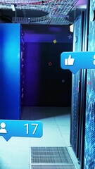  - Animation of digital notifications floating over servers in dimly lit data center