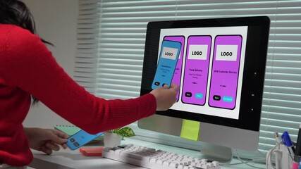 Woman software developer designing mobile application interface