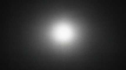 Poster - Soft Glow of Light on a Dark Surface Creating a Smooth and Calming Visual Effect for Background or Texture Use