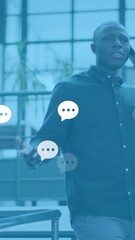Poster - Animation of social media reactions over african american man in office having call