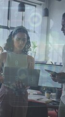 Poster - The clip features a group of businesspeople discussing work at a modern office