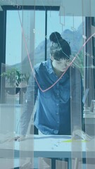 Poster - Animation of statistical data processing against woman working on a plan at office