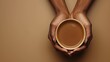 © AlexTroi - Close-up of dark-skinned hands with manicured nails holding a warm cup of brown coffee—ideal for comfort, wellness, or diversity-centered content.