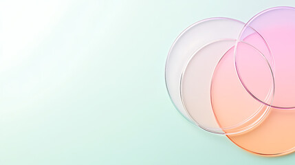 Aufkleber - Overlapping transparent circles in pastel tones of pink, orange, and white create an abstract and minimalist design on a light turquoise background.