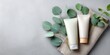 © Paradox - Cosmetic bottles with eucalyptus flowers towels and linen on pastel background top view flat lay natural organic skincare and spa concept perfect for beauty product branding body care wellness design