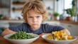 © Lens Legacy - Child expresses dislike for vegetables in a cozy kitchen setting