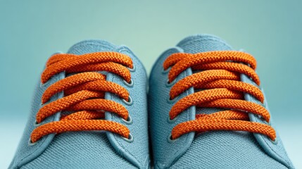 Poster - Close-up of shoelaces tied neatly on plain casual shoes against soft pastel background