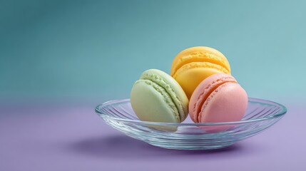 Poster - Elegant display of macarons in pastel colors on a glass plate with soft shadows and wide empty background