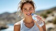 © Lens Legacy - Woman smiles while enjoying refreshing water in a sunny outdoor setting