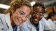 © Lens Legacy - Young scientists engaged in collaborative research at a bustling laboratory