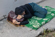 © Mikhail - Homeless man sleeping. Poverty concept