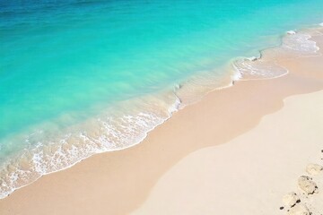 Wall Mural - Fine, light-colored sand gently slopes down to meet the tranquil, turquoise ocean waves on a sunny day Perfect for travel, vacation, or coastal themed projects , seascape, beach, tropical