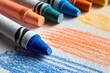 © YanabY - Colorful crayons create vibrant patterns on white paper, showcasing creativity and artistic expression during a playtime activity