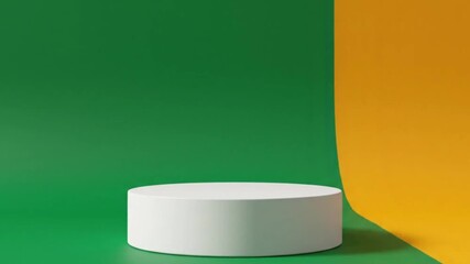 Leinwandbilder - A white cylinder stands on a glossy green surface against a matte green background