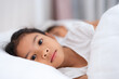 © Naypong Studio - Two asian children sleeping peacefully in white bed holding hands