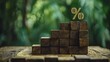 © PB Studio - wooden blocks creating a staircase with the last block tipping down showing percentage sign, illustrating fragile financial structure collapsing unstable finance concept investment loss macroeconomic