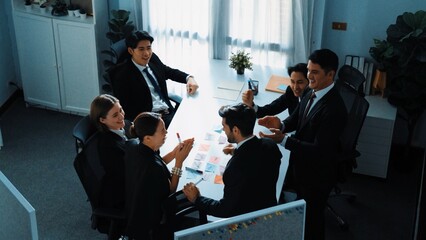 Poster - Top view of professional project manager present idea while putting hands together and clapping hand to celebrate successful strategy at meeting room. Show unity, love, teamwork concept. Directorate.
