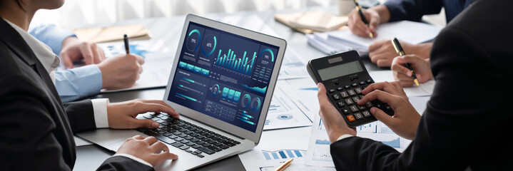 Poster - Business intelligence and data analysis concept. Analyst team working on financial data analysis dashboard on laptop screen as marketing indication for effective business strategic planning. Insight