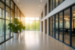 © ATRPhoto - blurred for background. office building interior, empty hall in the modern office building. empty open space office. panoramic windows and beautiful lighting. Corporate Workspace,  Business Interior