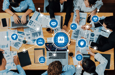 Poster - Diverse professionals collaborate in a modern workspace, analyzing AI concepts and data on tables filled with reports, laptops, and technology visuals. Amity