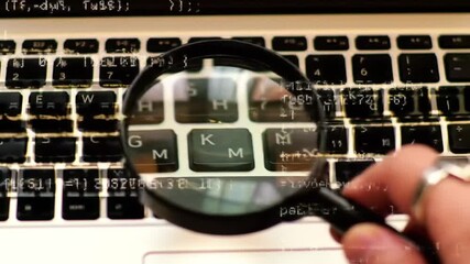 Poster - Hand Examining Laptop Keyboard with Magnifying Glass and Programming Code Overlays for Cybersecurity Data Analysis
