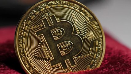 Poster - Macro Shot of a Golden Coin on Red Velvet Background Investment and Cryptocurrency